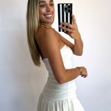 WHITE BUBBLE HEM RUCHED MINI DRESS
