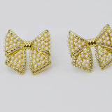 COQUETTE STUDD EARRINGS