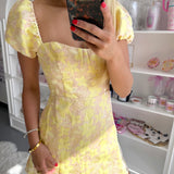 YELLOW FLORAL PUFF SLEEVE MINI DRESS (size large left)