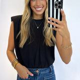 BLACK NECKLINE SHOULDER PAD BODYSUIT