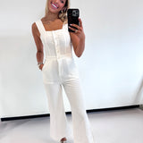 WHITE SQUARE NECK BUTTON JUMPSUIT (size small left)