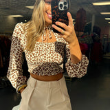 BEIGE ANIMAL PRINT CUTOUT TOP (size medium left)