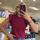 CRIMSON RUFFLE SLEEEVLESS TOP