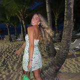 STRAPLESS PEACOCK BELTED DRESS