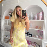 YELLOW FLORAL PUFF SLEEVE MINI DRESS (size large left)