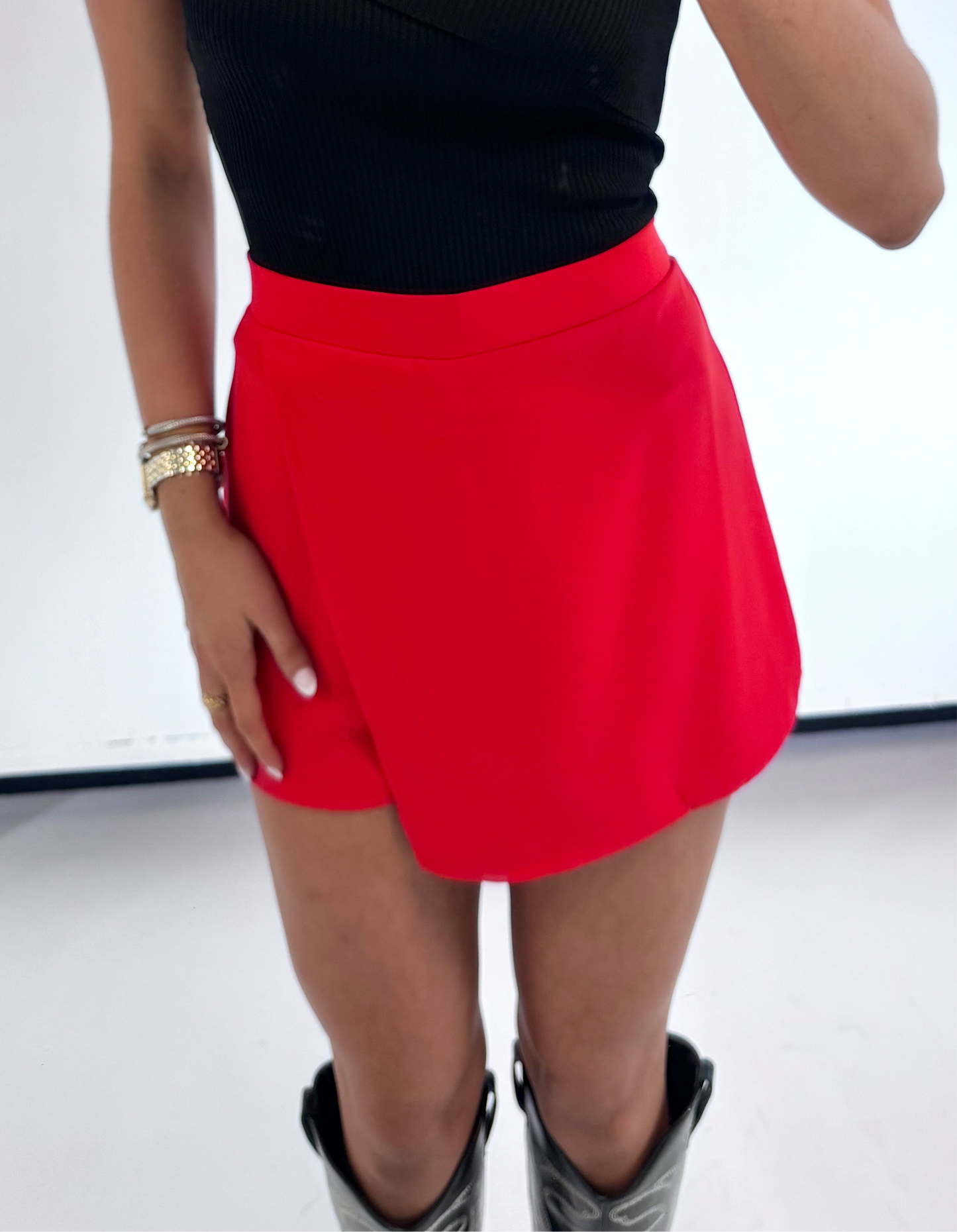 RED ASYMMETRICAL OVERLAY SKIRT