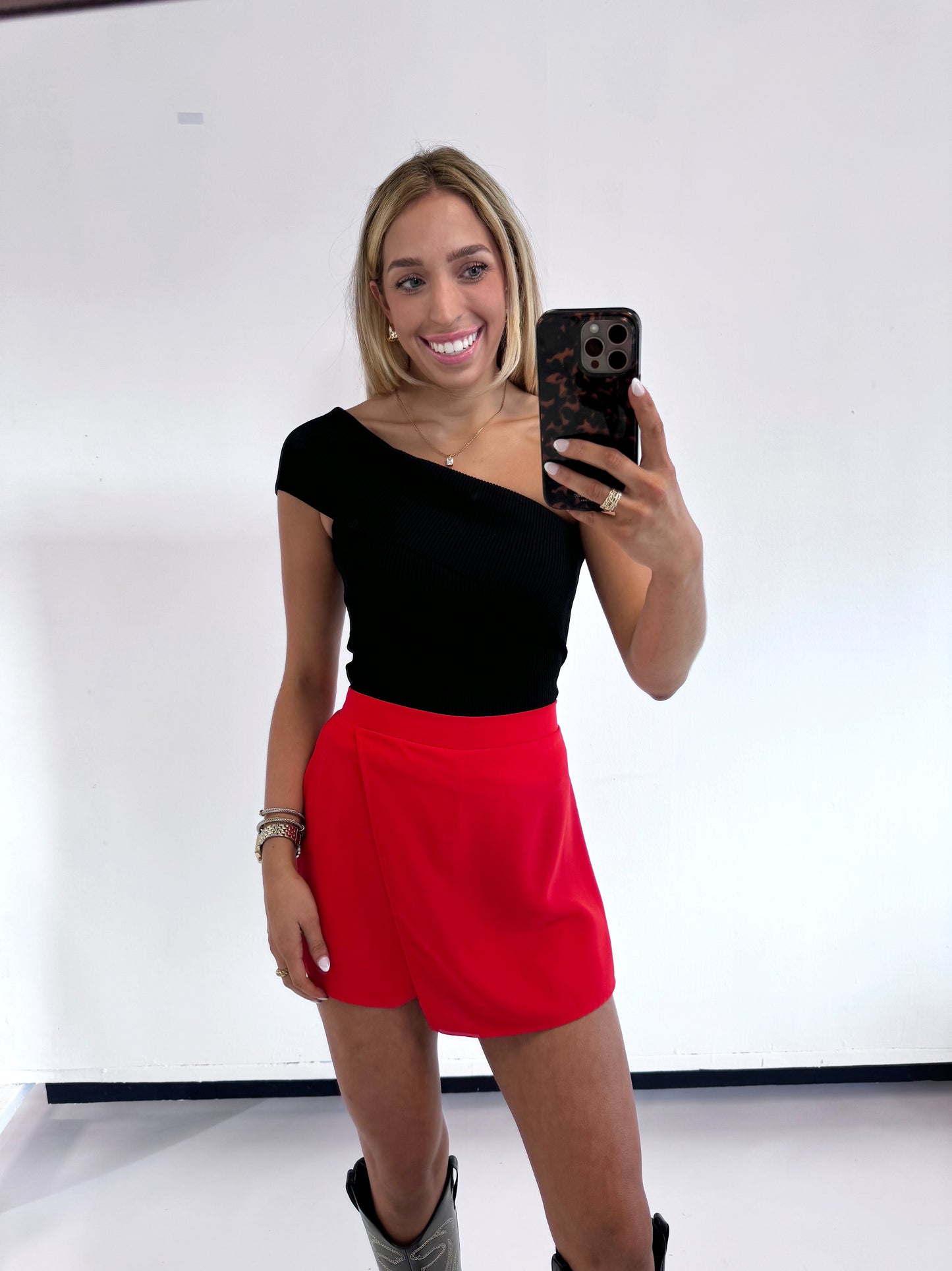 RED ASYMMETRICAL OVERLAY SKIRT