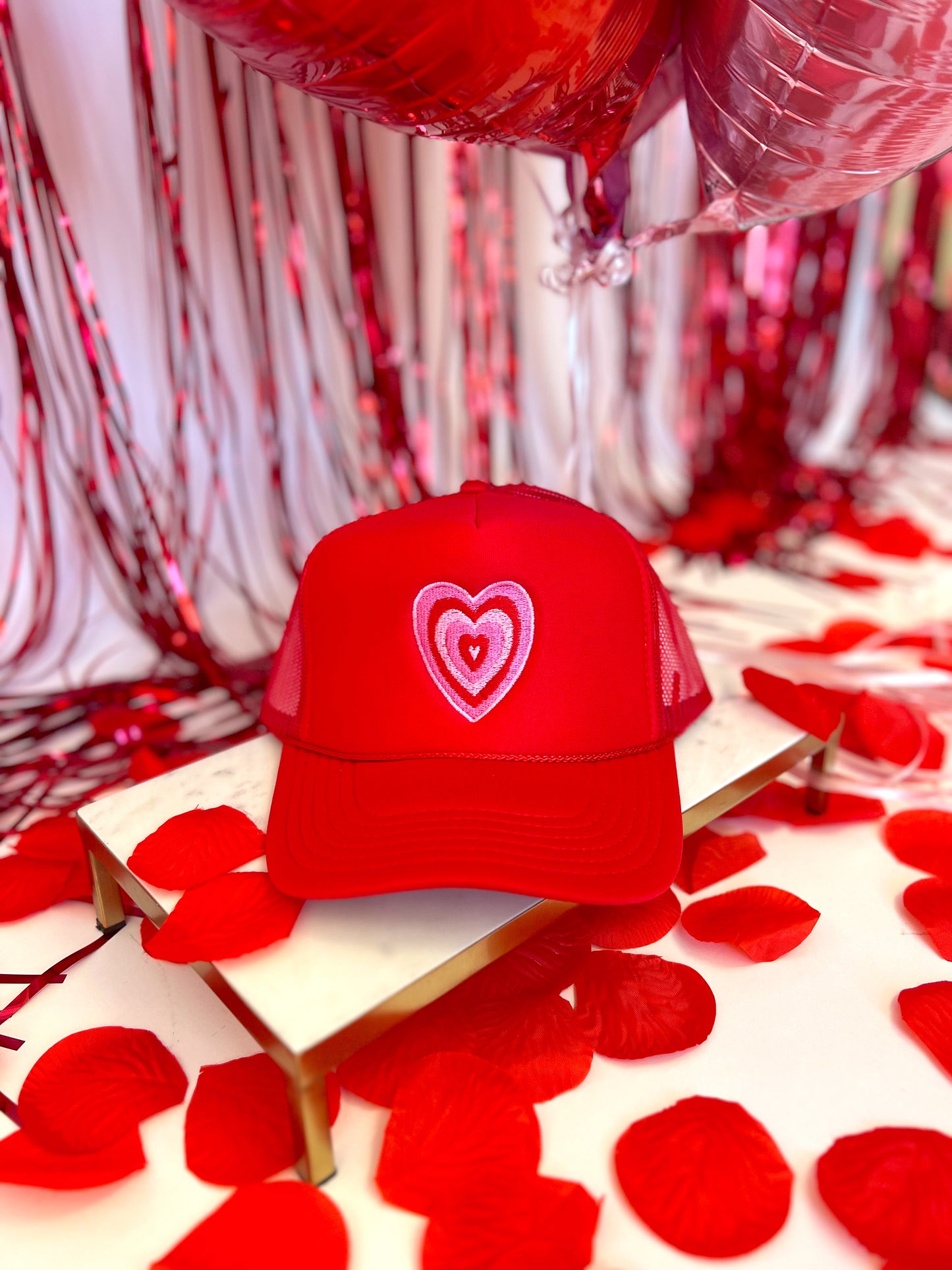 RED TRUCKER HAT WITH HEART