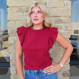 CRIMSON RUFFLE SLEEEVLESS TOP