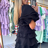BLACK RUFFLE TIERED MINI DRESS