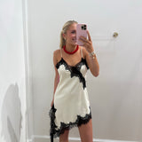 CREAM & BLACK LACE ASYMMETRIC DRESS